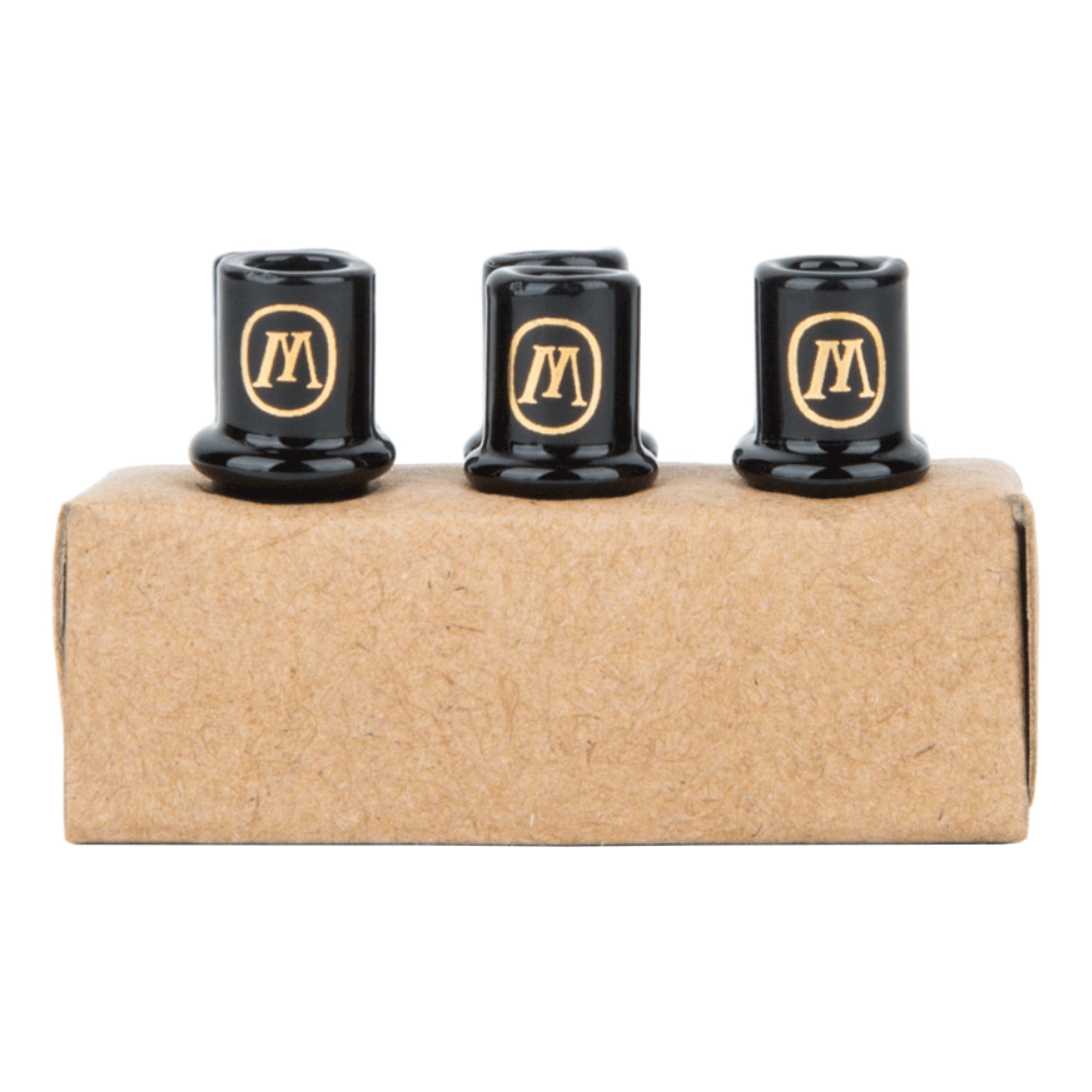 a couple of black knobs sitting on top of a cardboard box