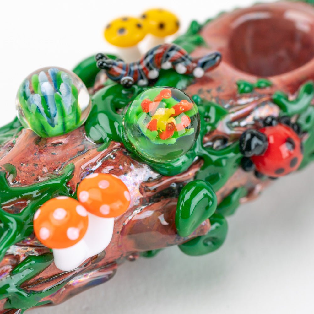 Mossy Log Steamroller Pipe Close up Marbles